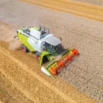 High-Efficiency, Low-Loss Harvesting · Grain Combine Harvester